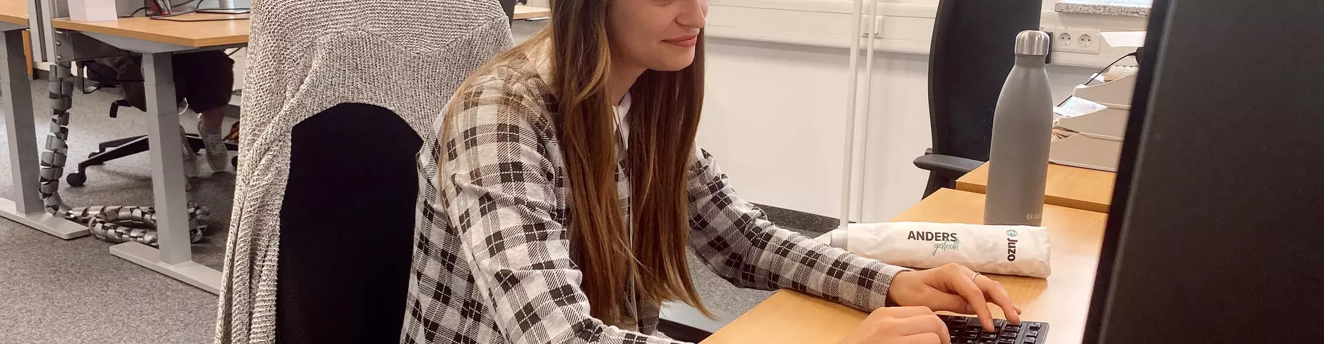 Nataliia an ihrem Arbeitsplatz
